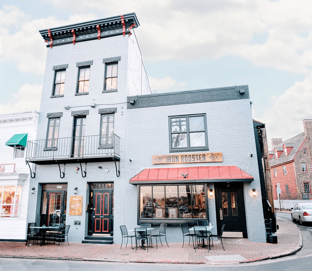 Iron rooster building front